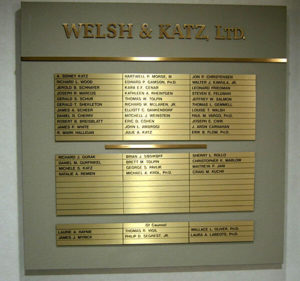 Photo of Welsh & Katz sign with A. Sidney Katz at top of the list of attorneys