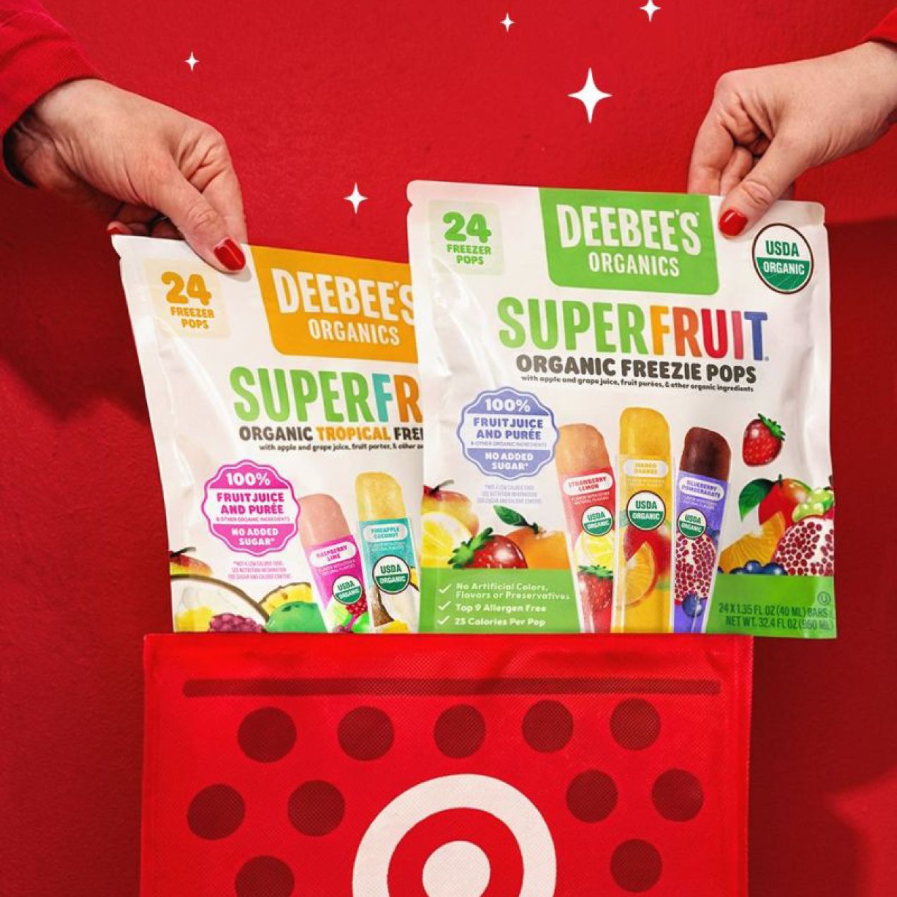 A photo of two hands holding two DeeBee’s Organics packages and placing them into a red Target bag